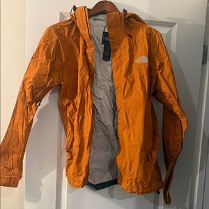 The North Face Vibrant Orange Windbreaker
